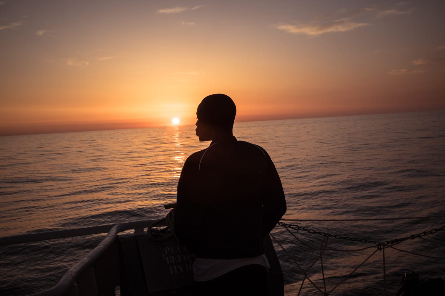 On February 23rd 2017, at sunrise, a young migrant observes the sea from the Aquarius.