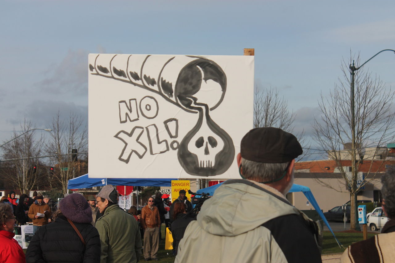 1280px-us-wa-olympia-heritagepark-kxl-pipelineprotest-2013-02-17-018