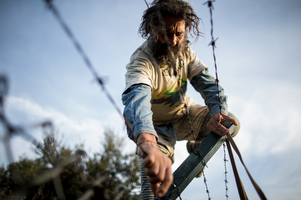 Peace in Nature. Niscemi, Sicily.                                       11/11/2015 . Turi bypasses the US military fence. He will remain climbed over the MOUS antennas for 48 hours without food or water.                                              ©Andrea Coco