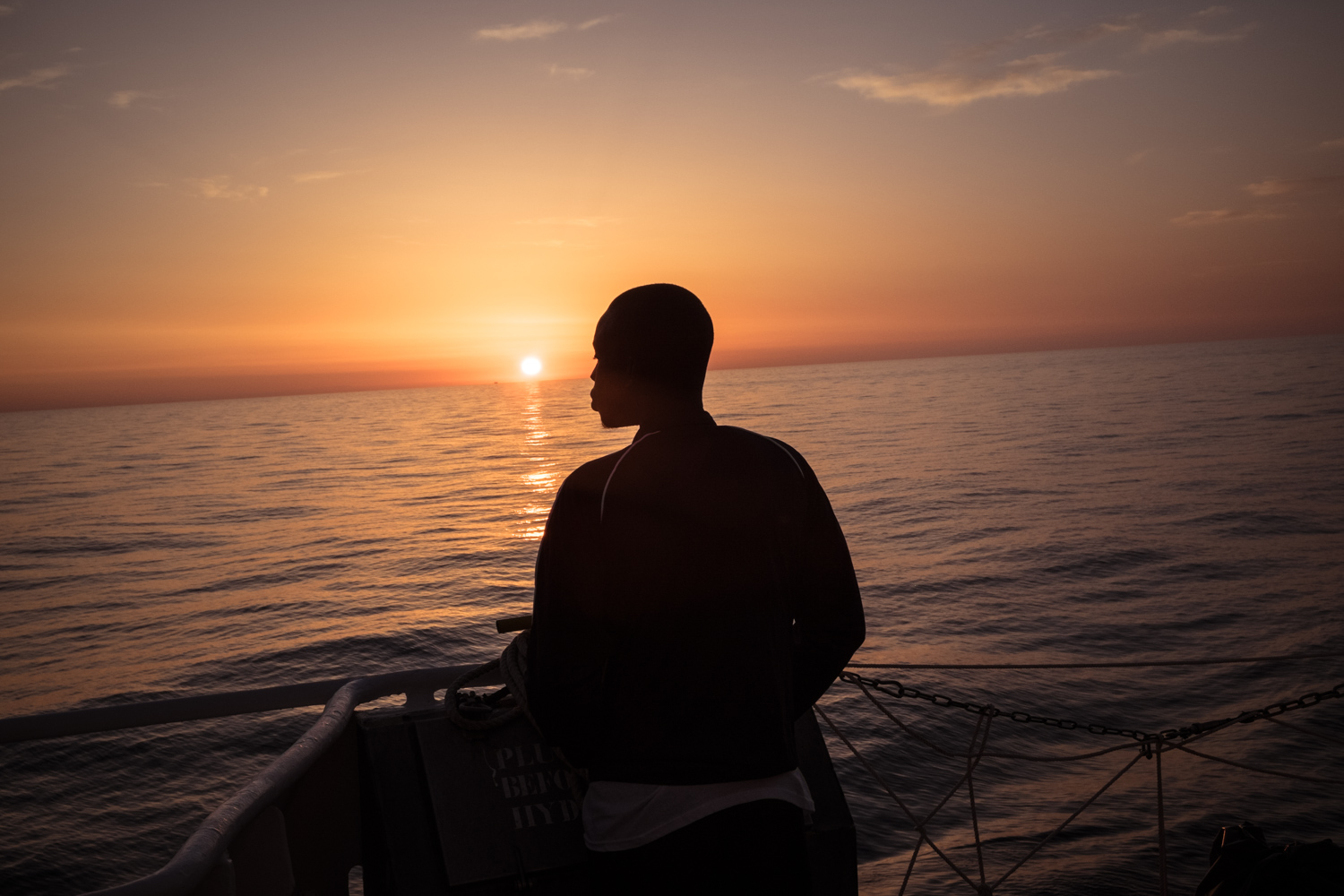 On February 23rd 2017, at sunrise, a young migrant observes the sea from the Aquarius.